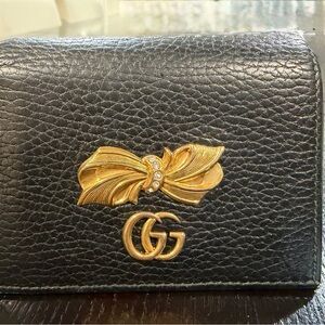 Authentic Gucci Black Compact Wallet with Gold Bow Detail